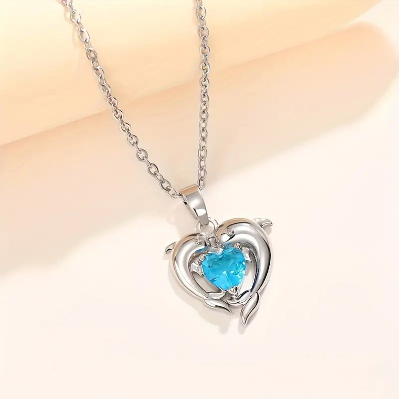 Silver Necklace Ailbhe with Dolphins and Sapphire Heart