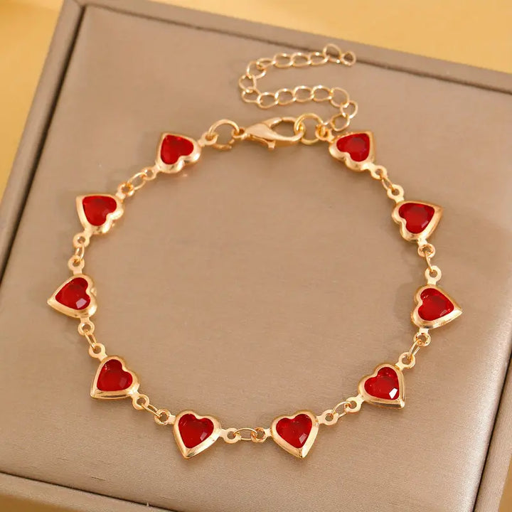 Gold Link Bracelet Aislinn with Ruby Hearts