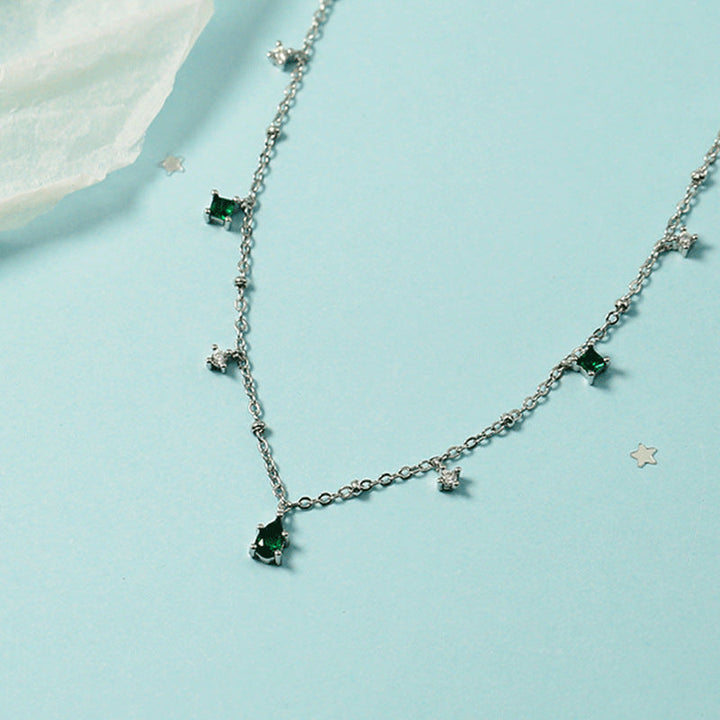 Gold Charm Necklace Eithne with Emeralds
