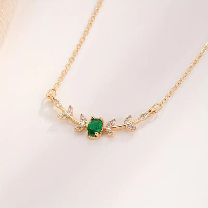 Gold Necklace Róisín with Emerald and Zirconia Leaves