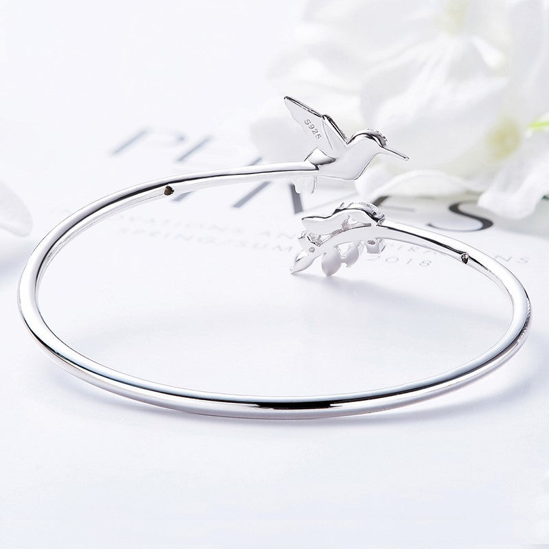 Silver Adjustable Ring with Emerald Hummingbird