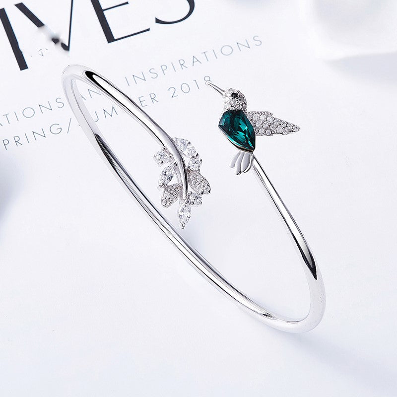 Silver Adjustable Ring with Emerald Hummingbird