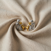 Gold & Silver Stud Earrings with Dog Cuddle Motif