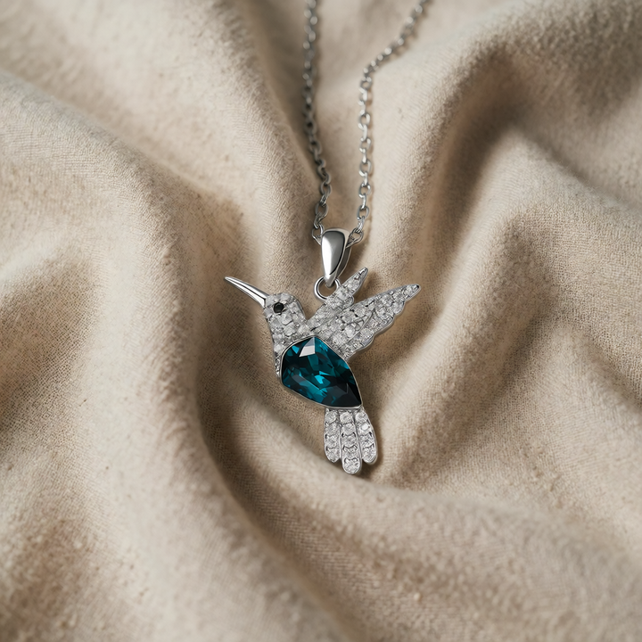 Silver Necklace Méadhbh with Hummingbird and Sapphire