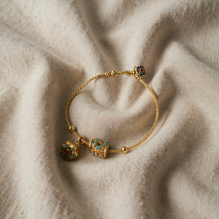 Gold Bangle Treasa with Turquoise Flower Charms