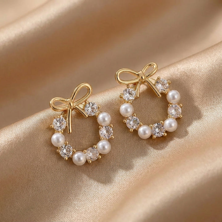 Gold Stud Earrings Eithne with Pearls, Zirconia and Bow