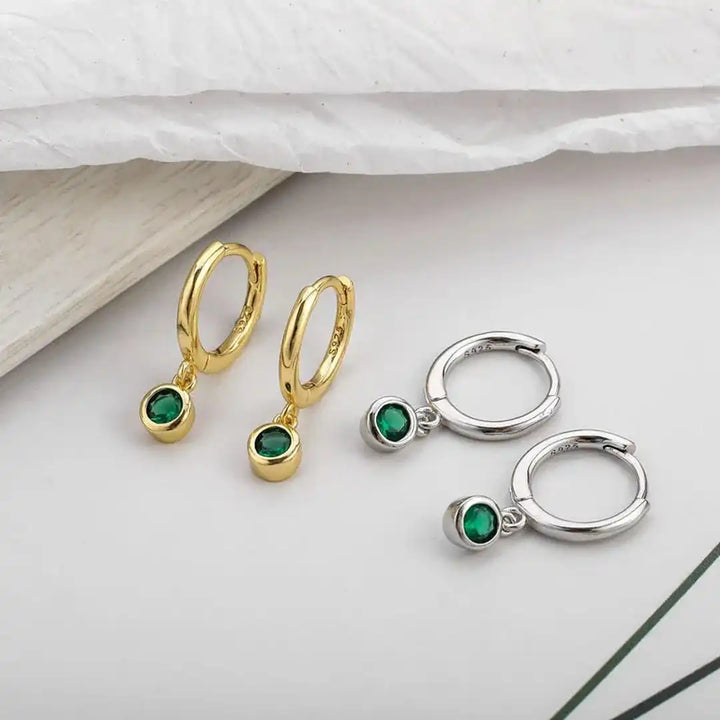 Gold Huggie Earrings Fiadh with Green Zirconia