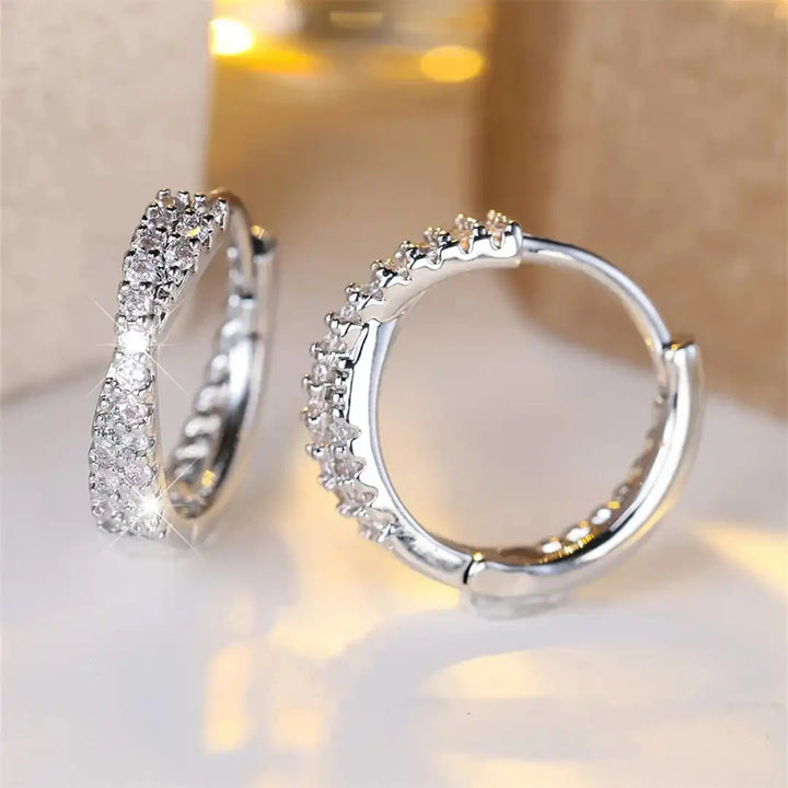 Gold Huggie Earrings Niamh with Zirconia