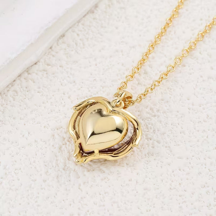 Gold Necklace Gobnait with Ruby Heart and Angel Wings