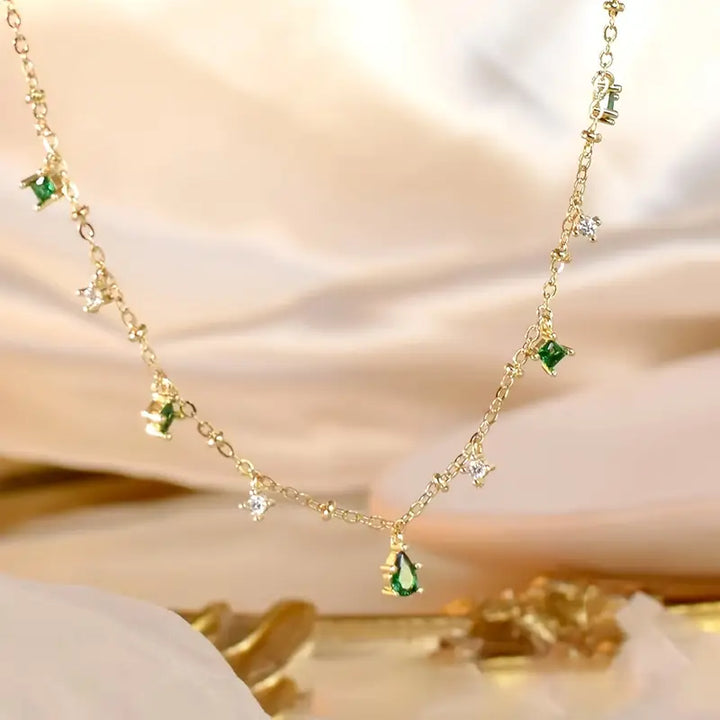 Gold Charm Necklace Eithne with Emeralds