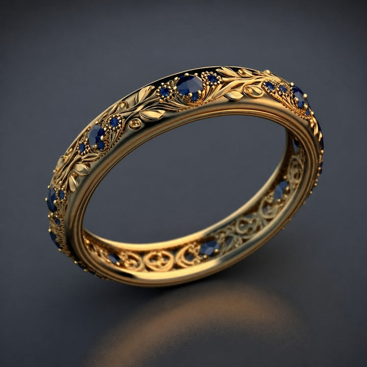 Gold Eternity Ring with Blue Sapphire and Floral Motif