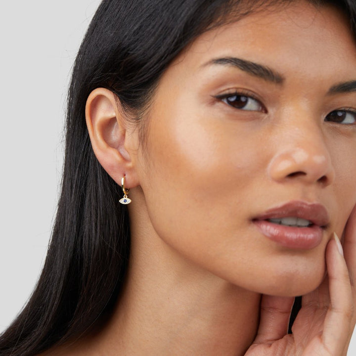 Gold Drop Earrings Íde with Sapphire Eye