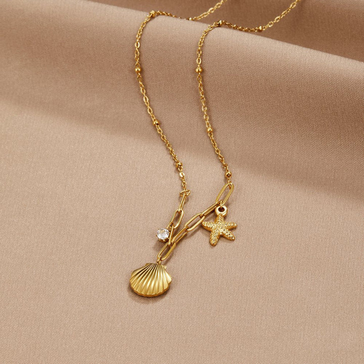 Gold Charm Necklace Clíona with Starfish and Shell